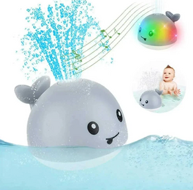 Плаваюча іграшка для купання малюків з розпилювачем Кит, з підсвічуванням / Дитяча іграшка фонтанчик у ванну